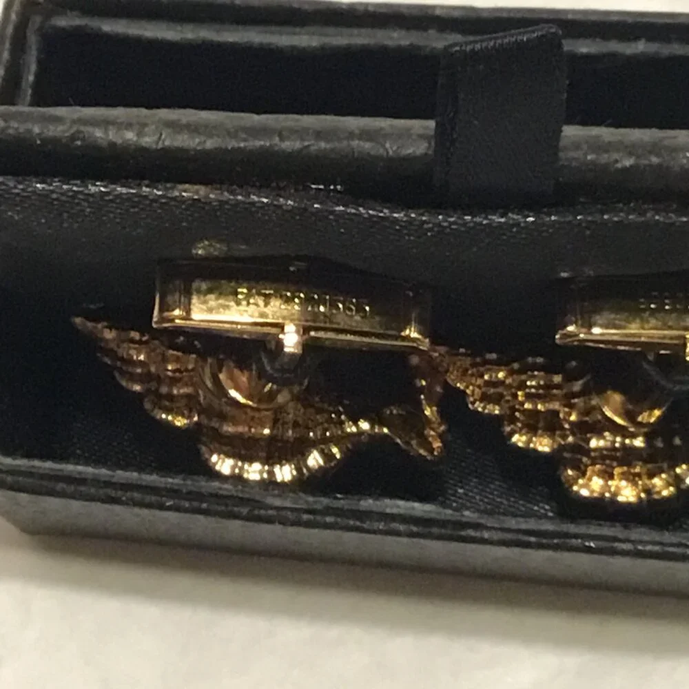 Vintage and exquisite pair of gold tone seashell shaped cufflinks w/ box